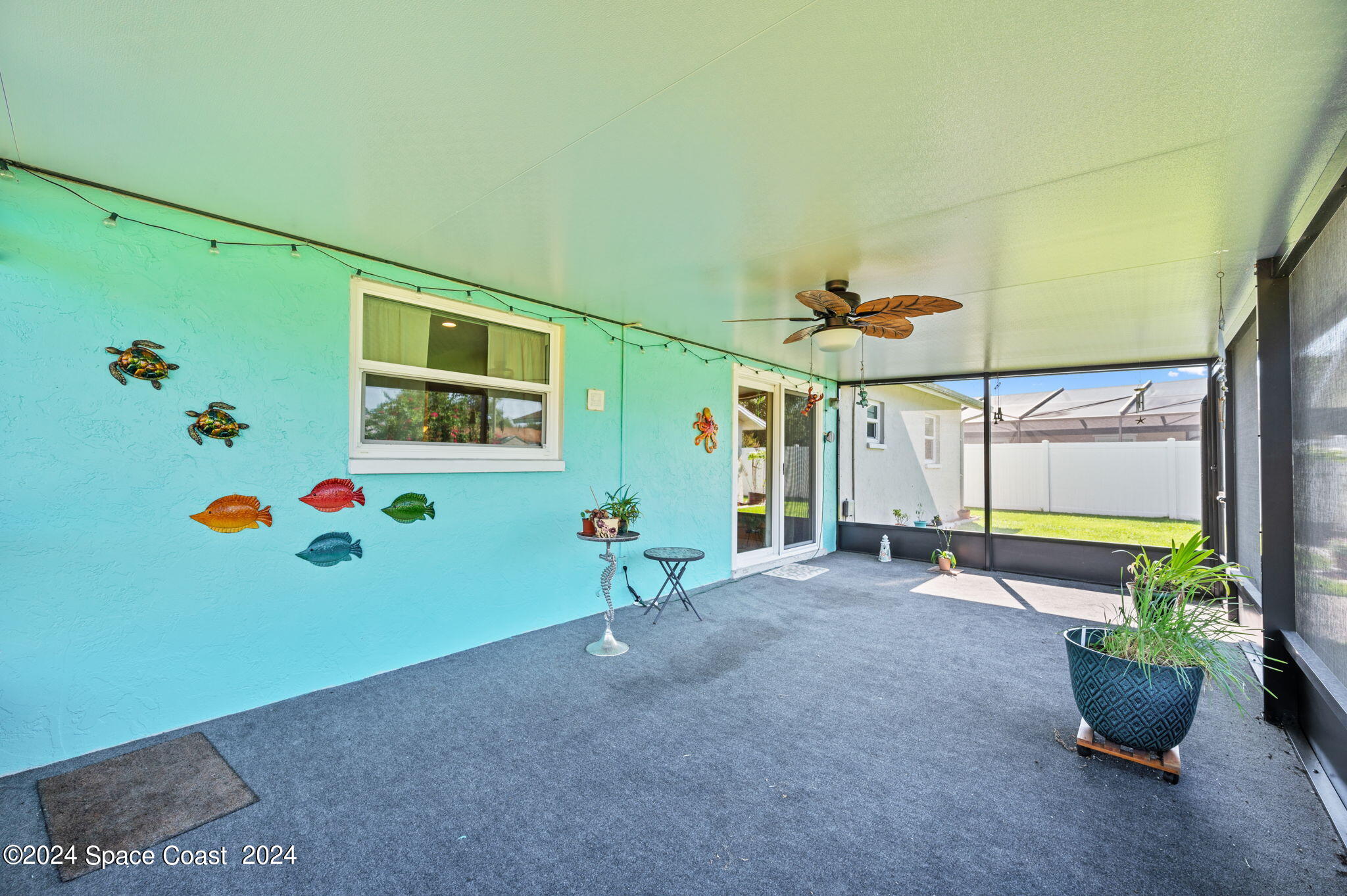 897 Brunswick Lane Rockledge, FL 32955 - Photo 27 of 41 a very nice looking room with a potted plant