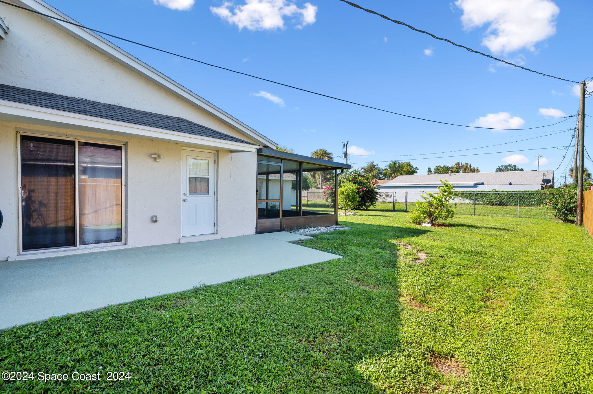 897 Brunswick Lane Rockledge, FL 32955 - Photo 30 of 41 a view of a house with backyard and porch