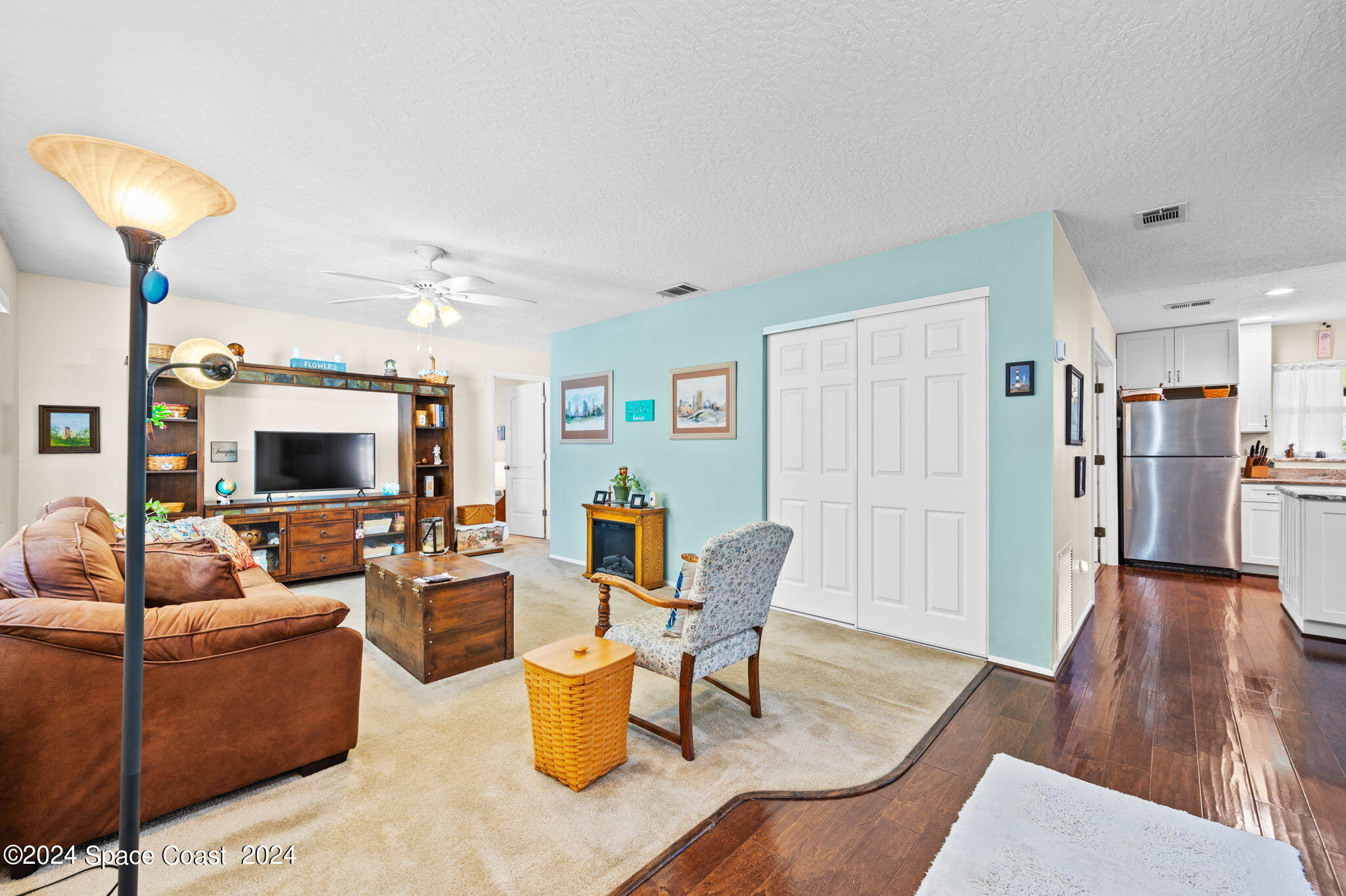 897 Brunswick Lane Rockledge, FL 32955 - Photo 3 of 41 a living room with furniture and a wooden floor