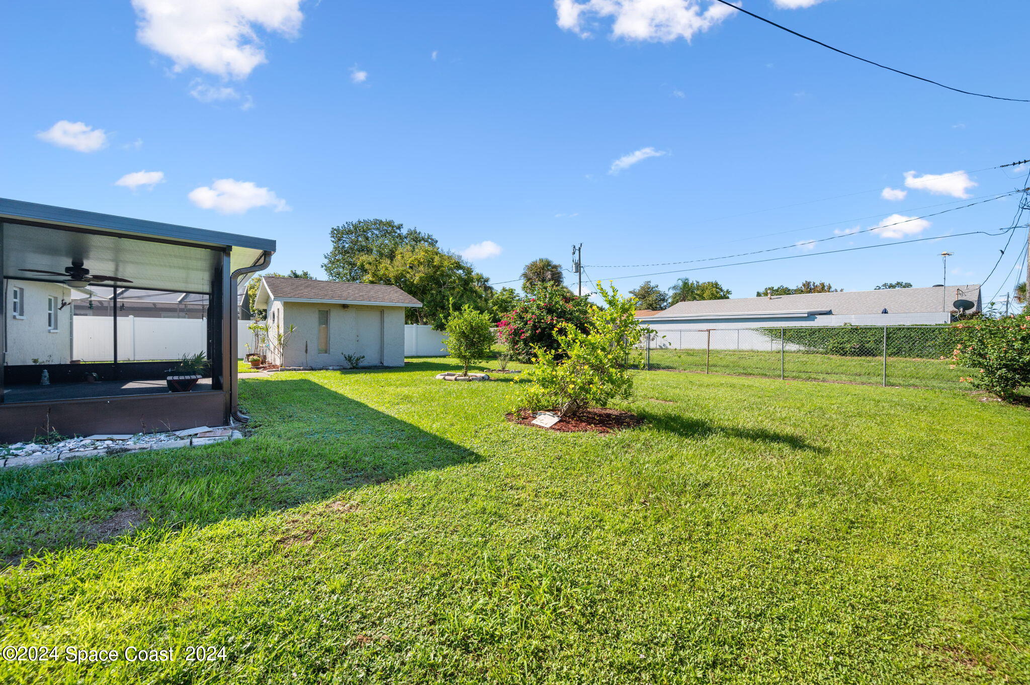 897 Brunswick Lane Rockledge, FL 32955 - Photo 31 of 41 a view of a porch with a yard
