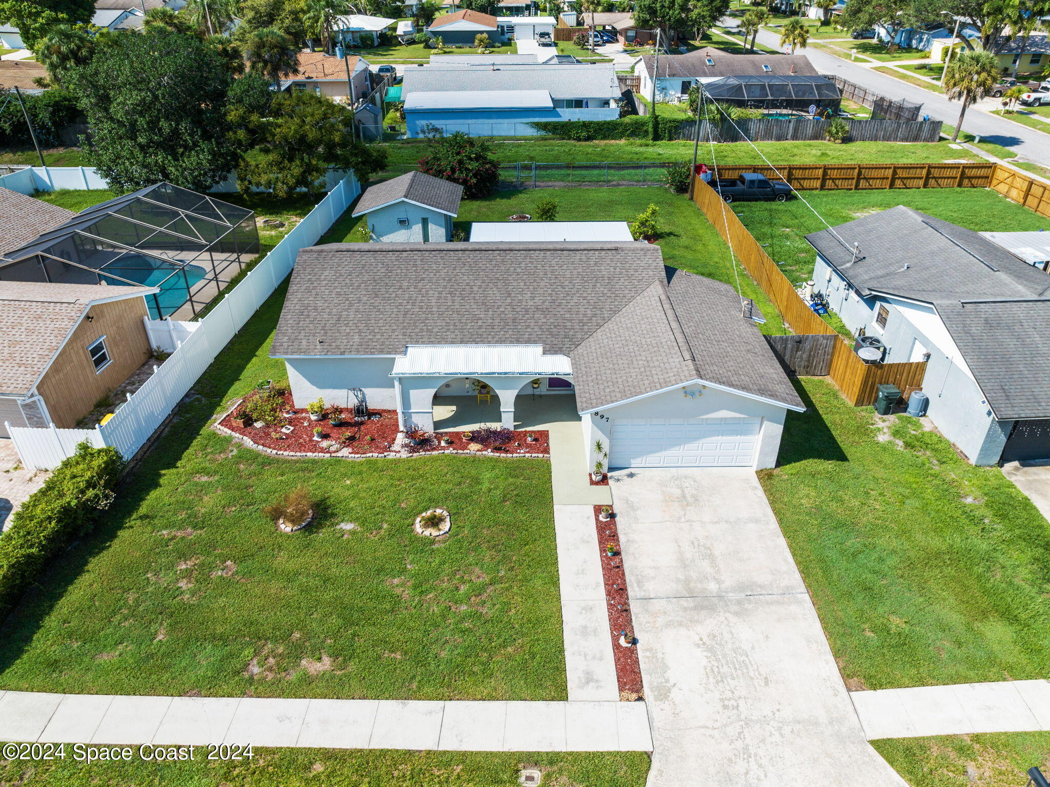 897 Brunswick Lane Rockledge, FL 32955 - Photo 36 of 41 a aerial view of a house with a yard