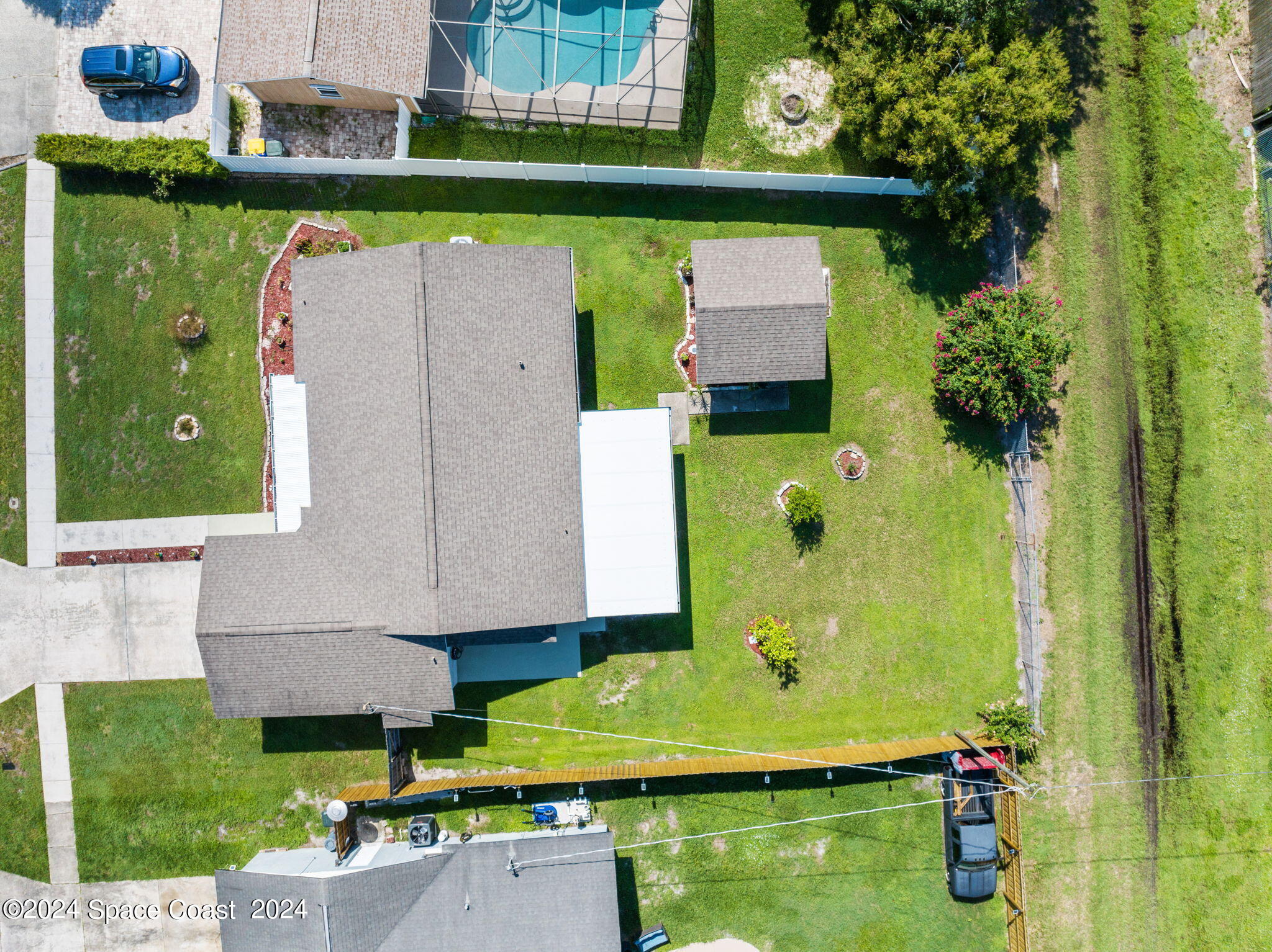 897 Brunswick Lane Rockledge, FL 32955 - Photo 37 of 41 an aerial view of a house with a swimming pool