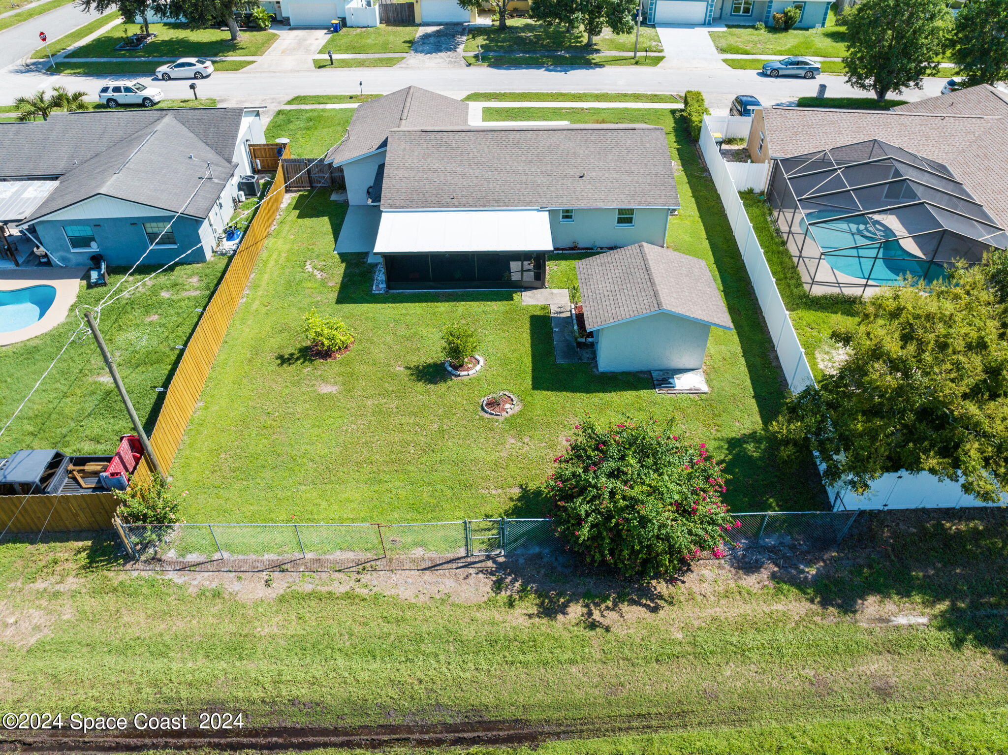 897 Brunswick Lane Rockledge, FL 32955 - Photo 38 of 41 a view of swimming pool with a yard