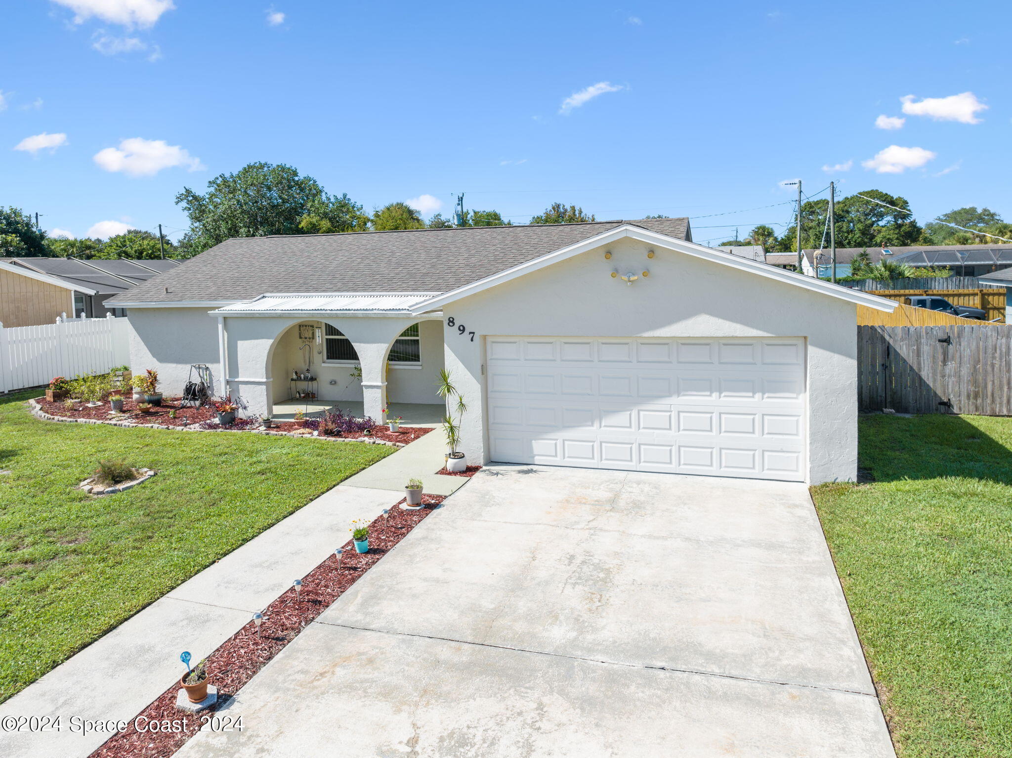 897 Brunswick Lane Rockledge, FL 32955 - Photo 41 of 41 a view of outdoor space yard and front view of a house