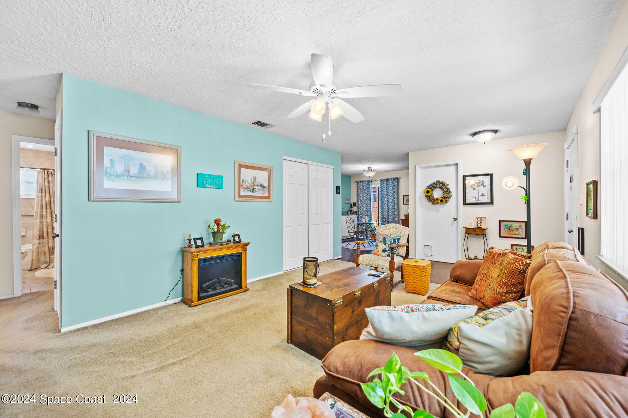 897 Brunswick Lane Rockledge, FL 32955 - Photo 5 of 41 a living room with furniture
