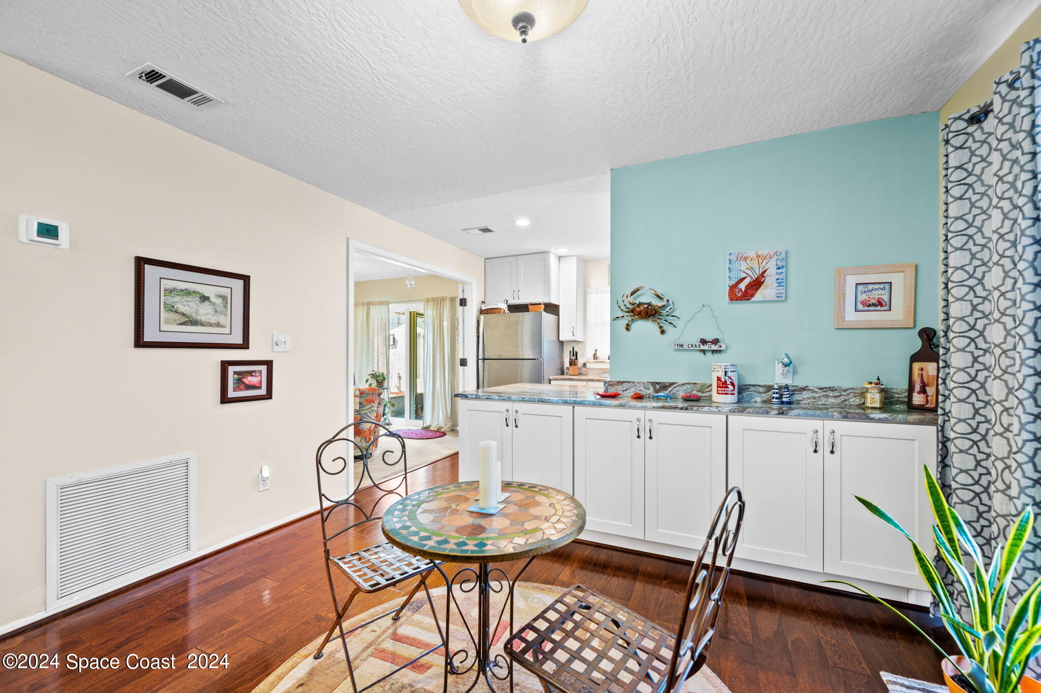 897 Brunswick Lane Rockledge, FL 32955 - Photo 10 of 41 a room with furniture and entryway