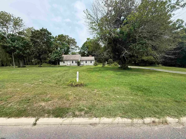 a fire hydrant in the middle of a field