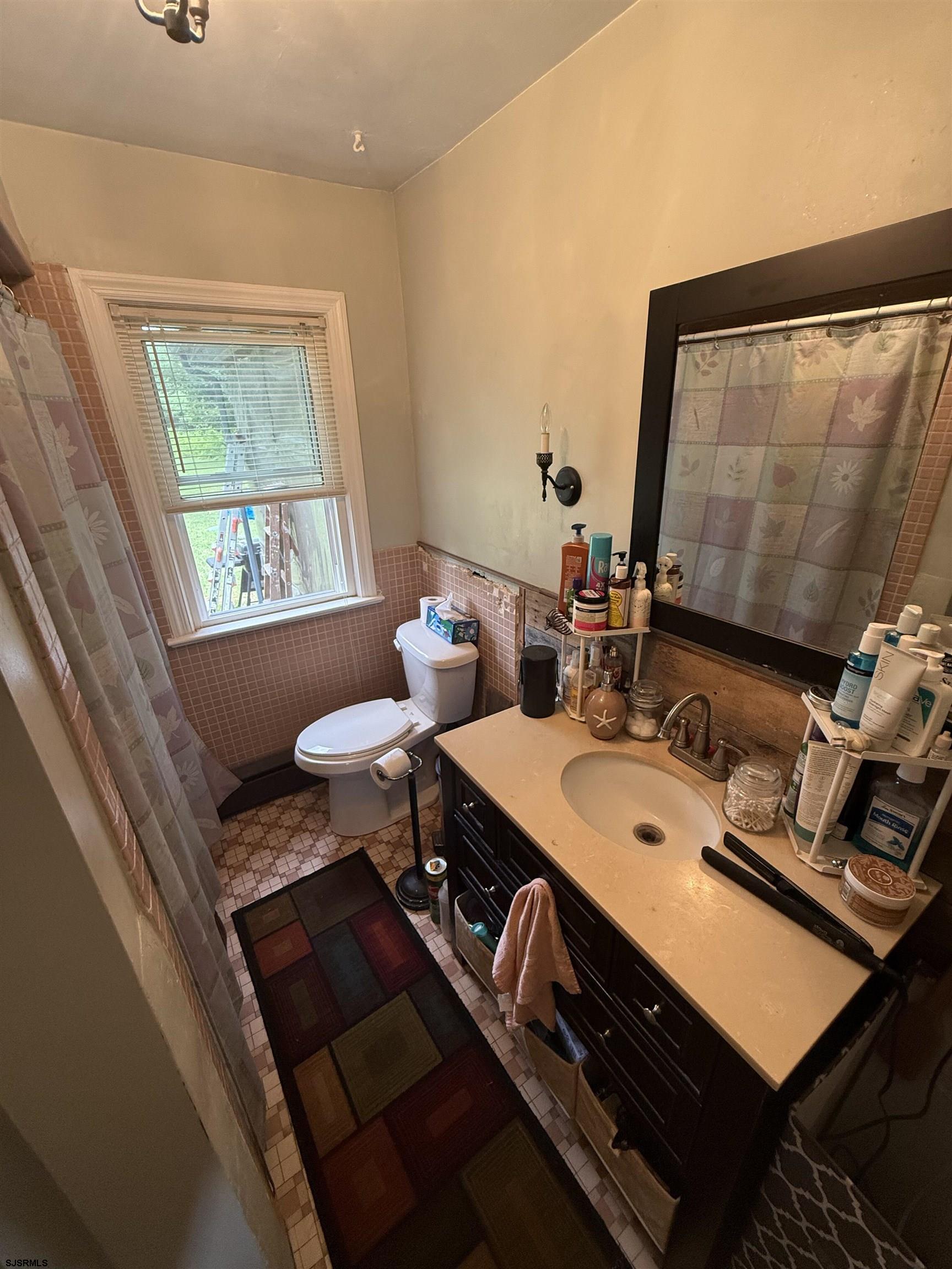 34 Back Neck Road Bridgeton, NJ 08302 - Photo 12 of 38 a bathroom with a sink mirror and toilet