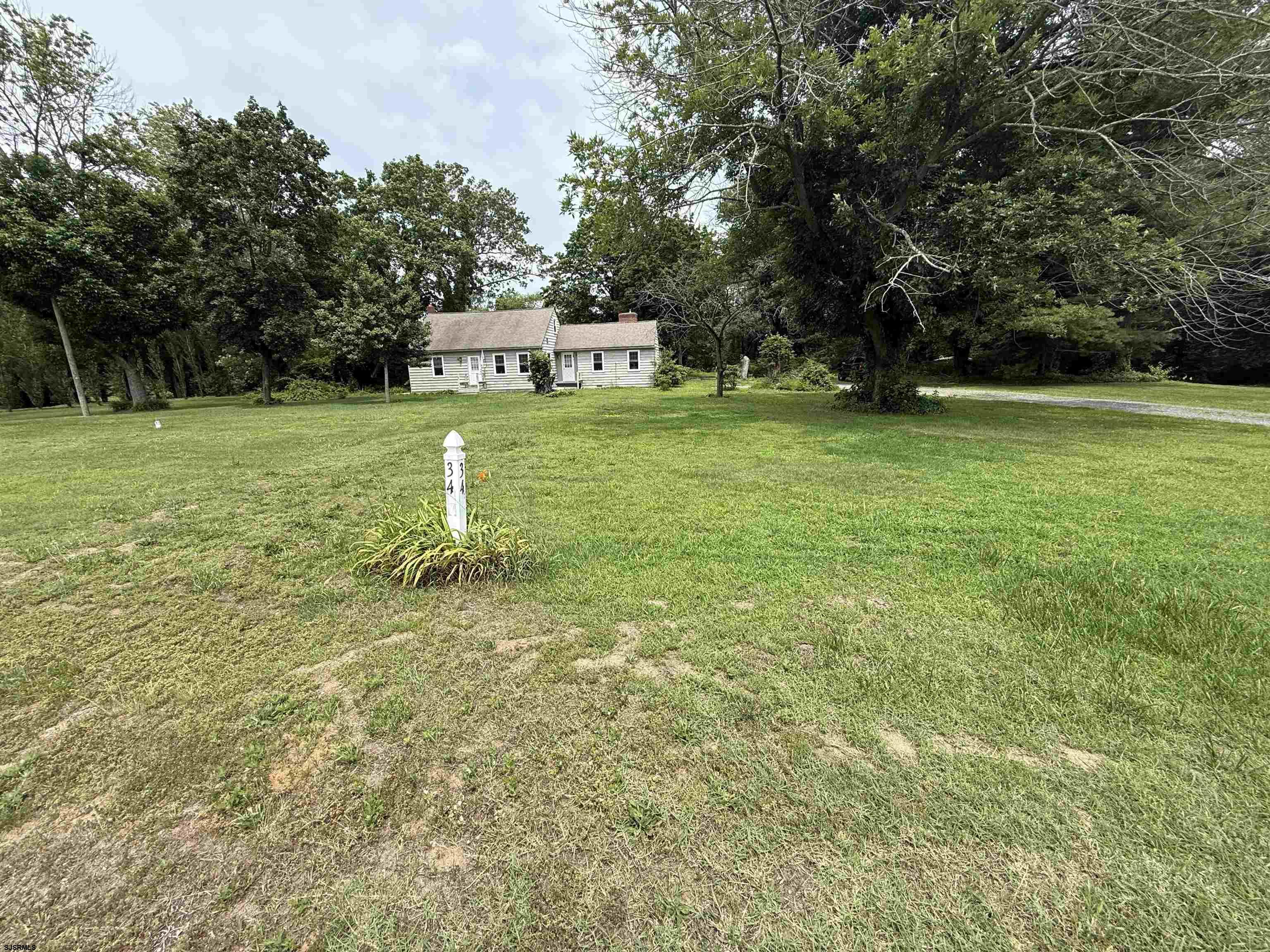 34 Back Neck Road Bridgeton, NJ 08302 - Photo 2 of 38 a green field with trees in the background