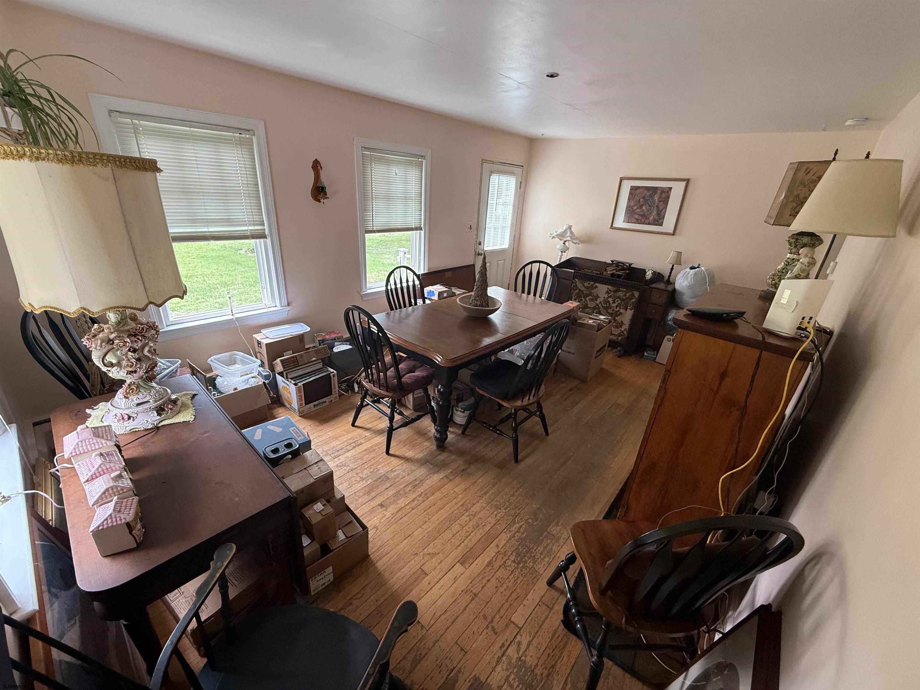 34 Back Neck Road Bridgeton, NJ 08302 - Photo 7 of 38 a living room with furniture a window and a flat screen tv
