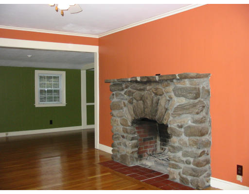 363 Hudson Road Stow, MA 01775 - Photo 4 of 8 a view of a fireplace in a room