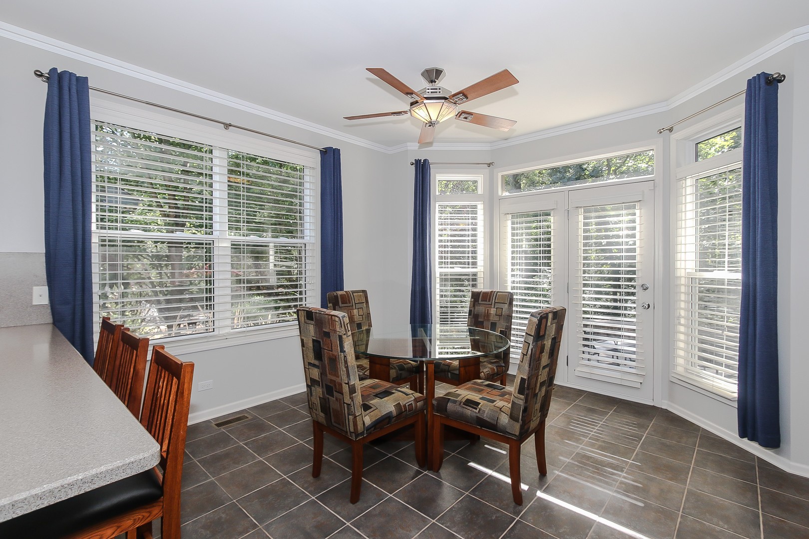 617 West Ruhl Road Palatine, IL 60074 - Photo 14 of 47 a view of a dining room with furniture window and outside view