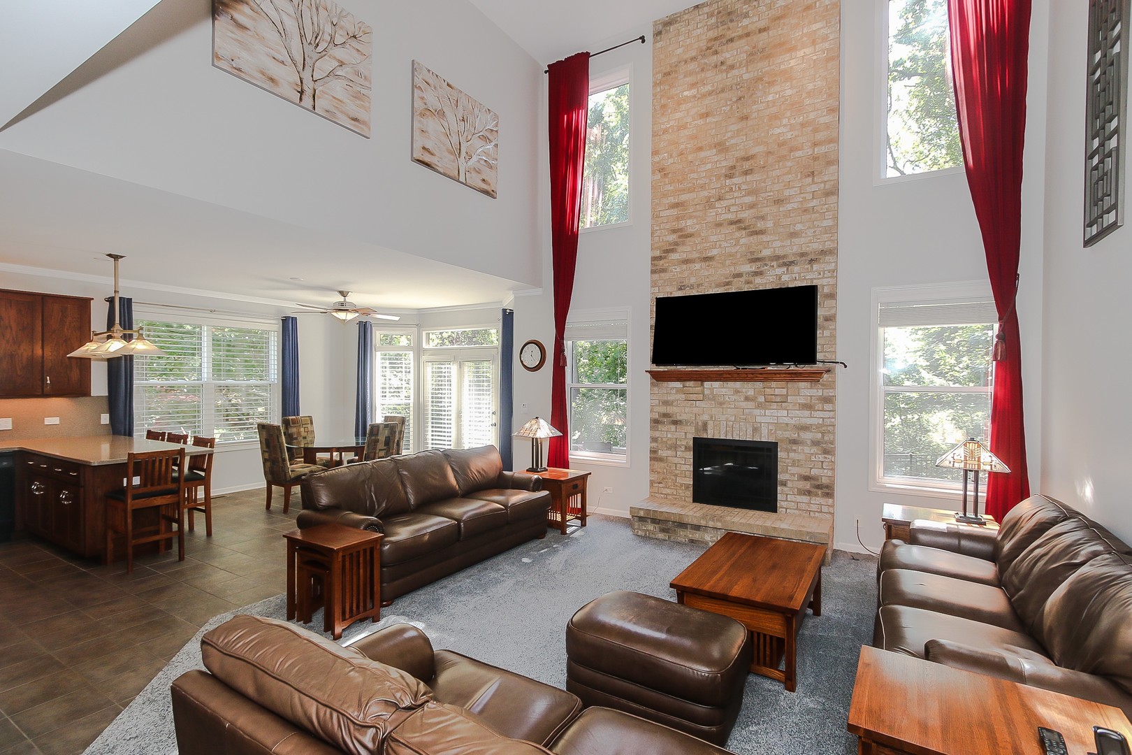 617 West Ruhl Road Palatine, IL 60074 - Photo 16 of 47 a living room with furniture fireplace and flat screen tv