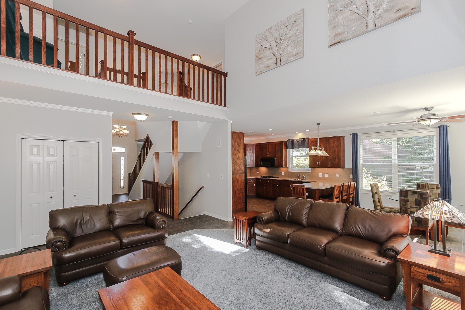 617 West Ruhl Road Palatine, IL 60074 - Photo 17 of 47 a living room with furniture and a wooden floor