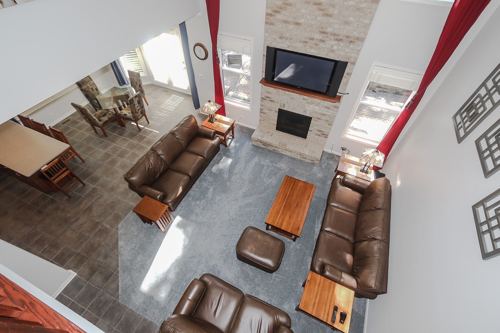 617 West Ruhl Road Palatine, IL 60074 - Photo 18 of 47 a living room with furniture and a flat screen tv
