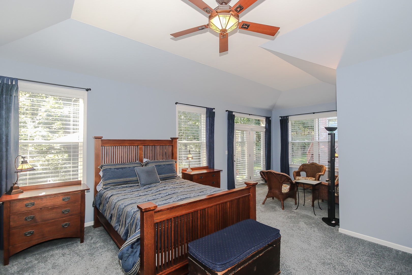 617 West Ruhl Road Palatine, IL 60074 - Photo 19 of 47 a bedroom with a bed and large windows