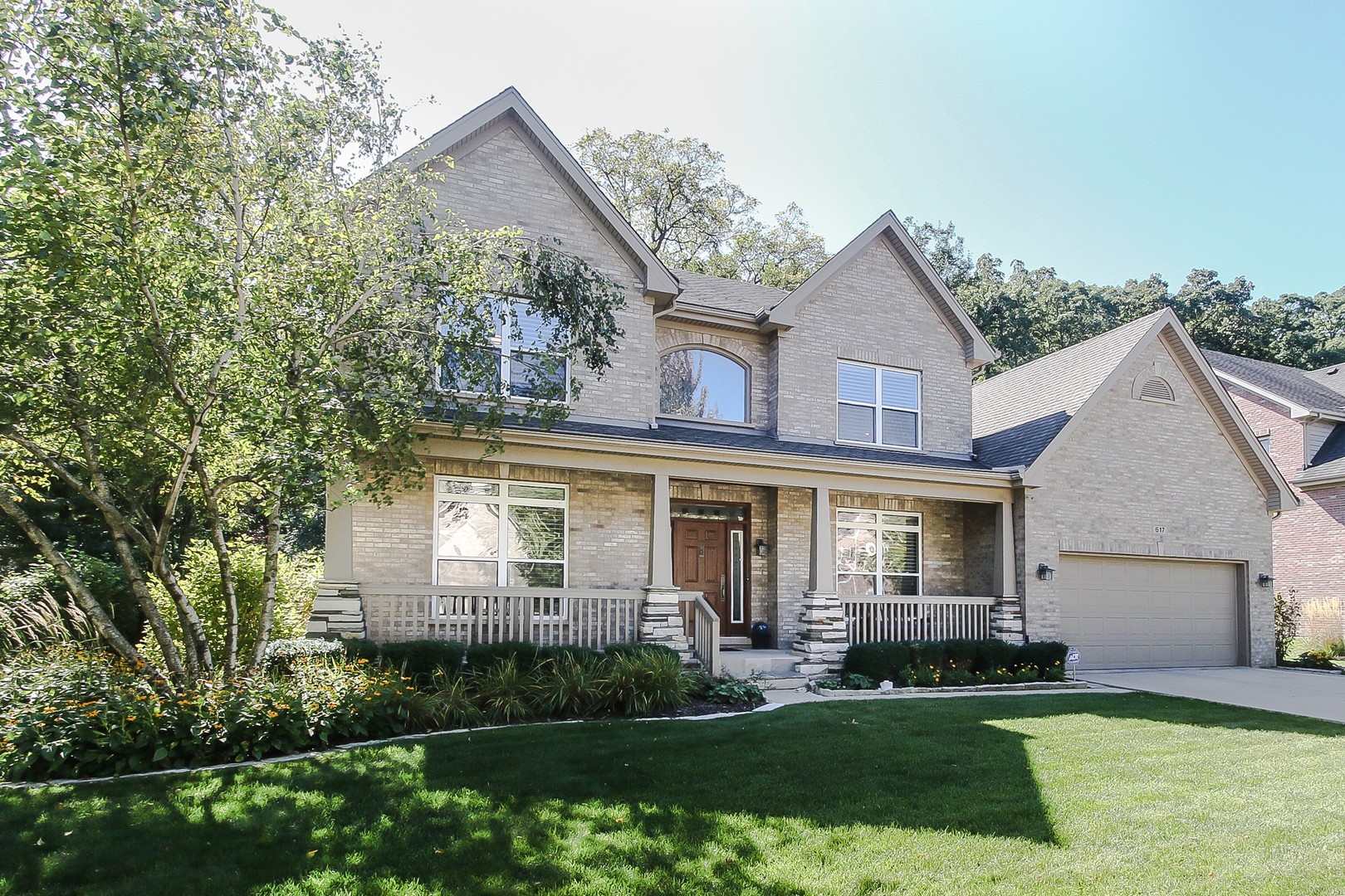 617 West Ruhl Road Palatine, IL 60074 - Photo 3 of 47 front view of a house and a yard