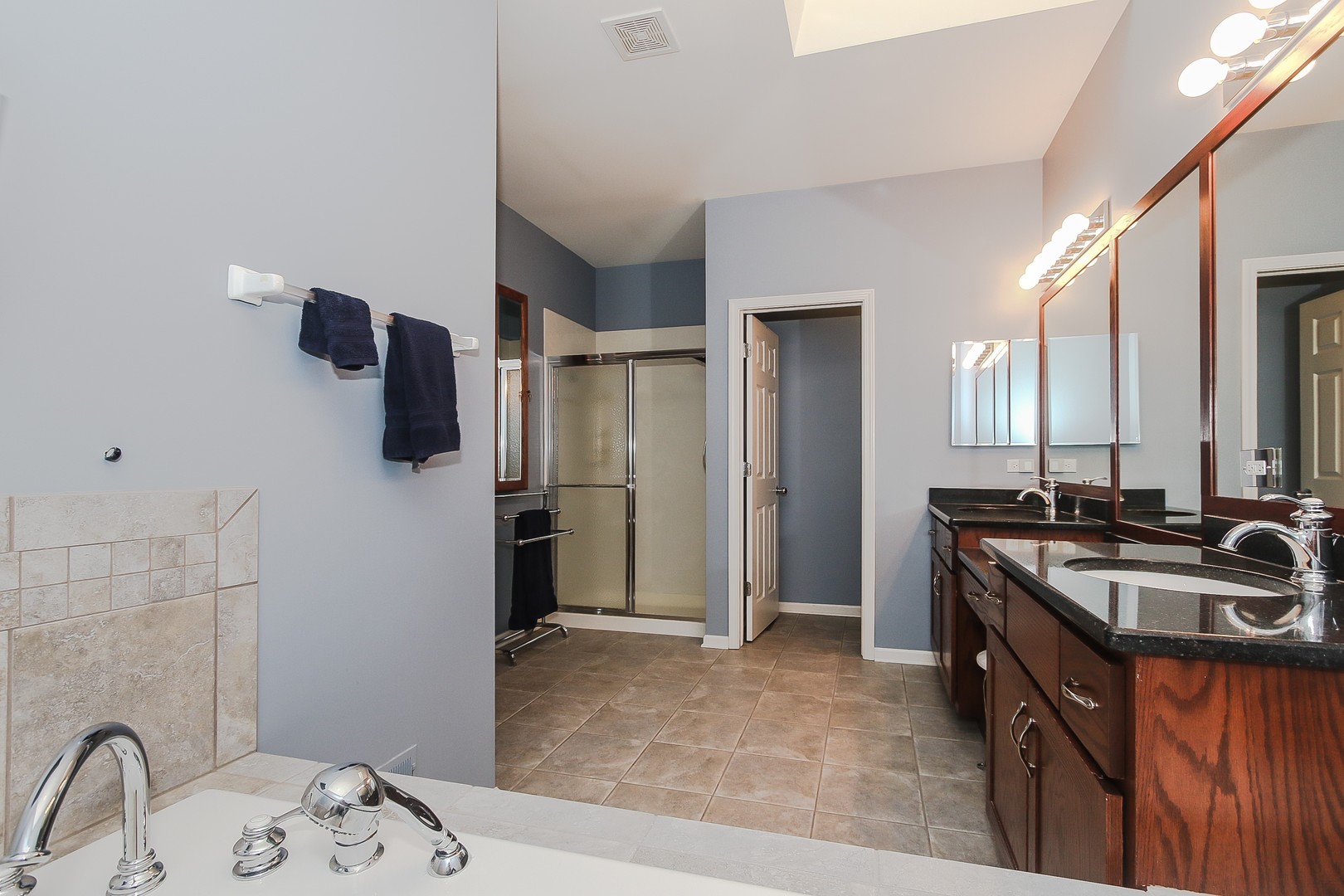 617 West Ruhl Road Palatine, IL 60074 - Photo 23 of 47 a kitchen with a sink and a refrigerator