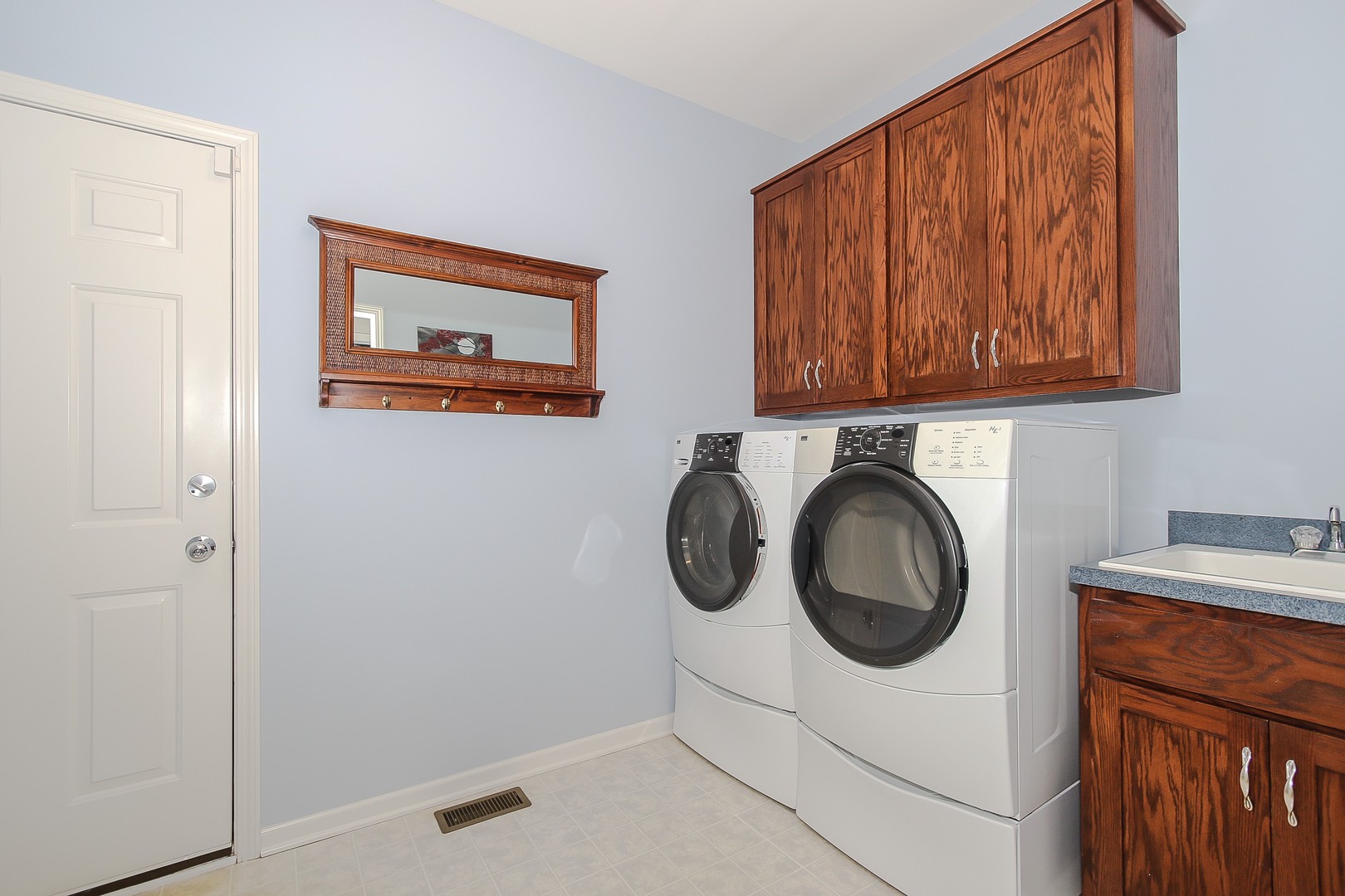 617 West Ruhl Road Palatine, IL 60074 - Photo 24 of 47 a utility room with dryer and washer