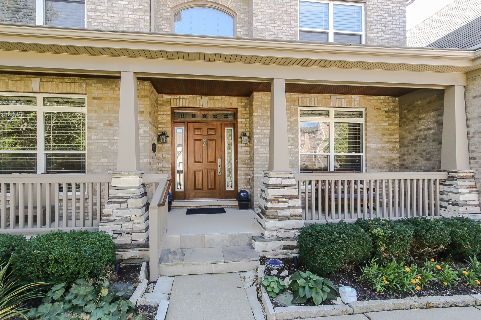 617 West Ruhl Road Palatine, IL 60074 - Photo 4 of 47 a front view of a house with a porch