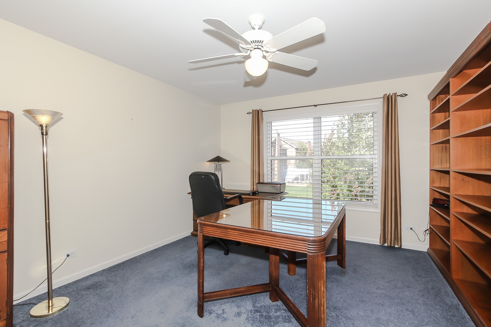 617 West Ruhl Road Palatine, IL 60074 - Photo 33 of 47 a view of a workspace with furniture and a window