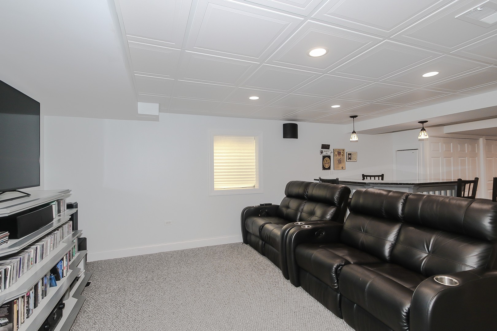 617 West Ruhl Road Palatine, IL 60074 - Photo 38 of 47 a living room with furniture and a flat screen tv