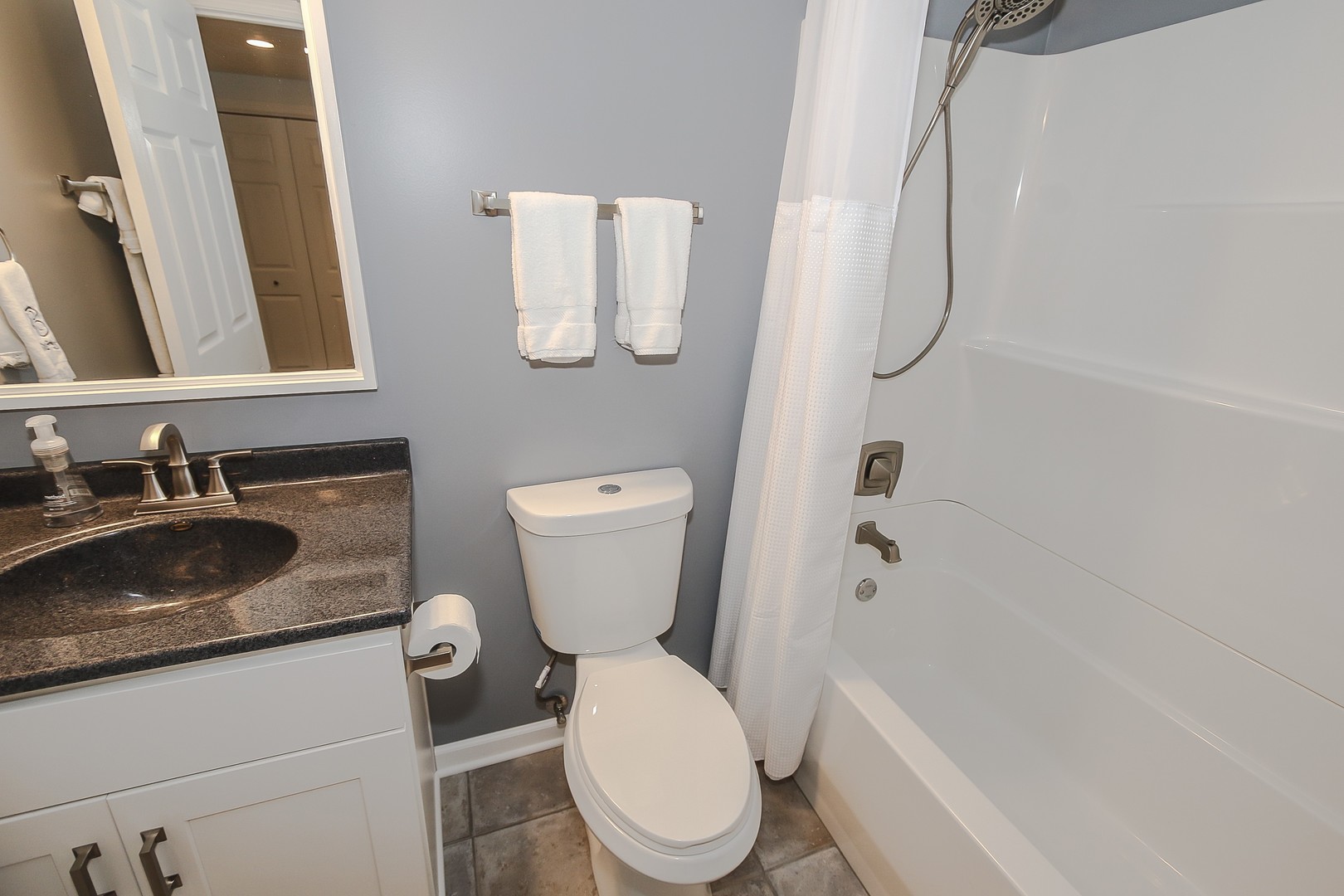 617 West Ruhl Road Palatine, IL 60074 - Photo 39 of 47 a bathroom with a granite countertop sink toilet and shower