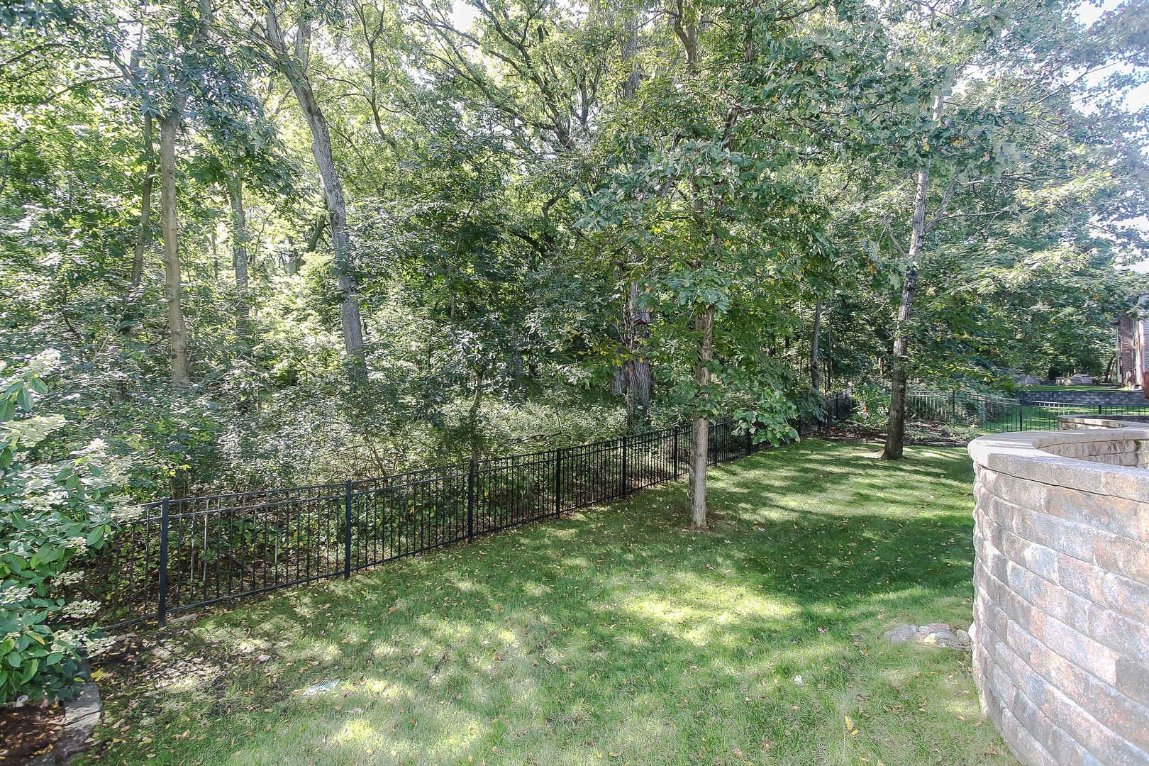 617 West Ruhl Road Palatine, IL 60074 - Photo 42 of 47 a big yard with lots of green space and trees in the background