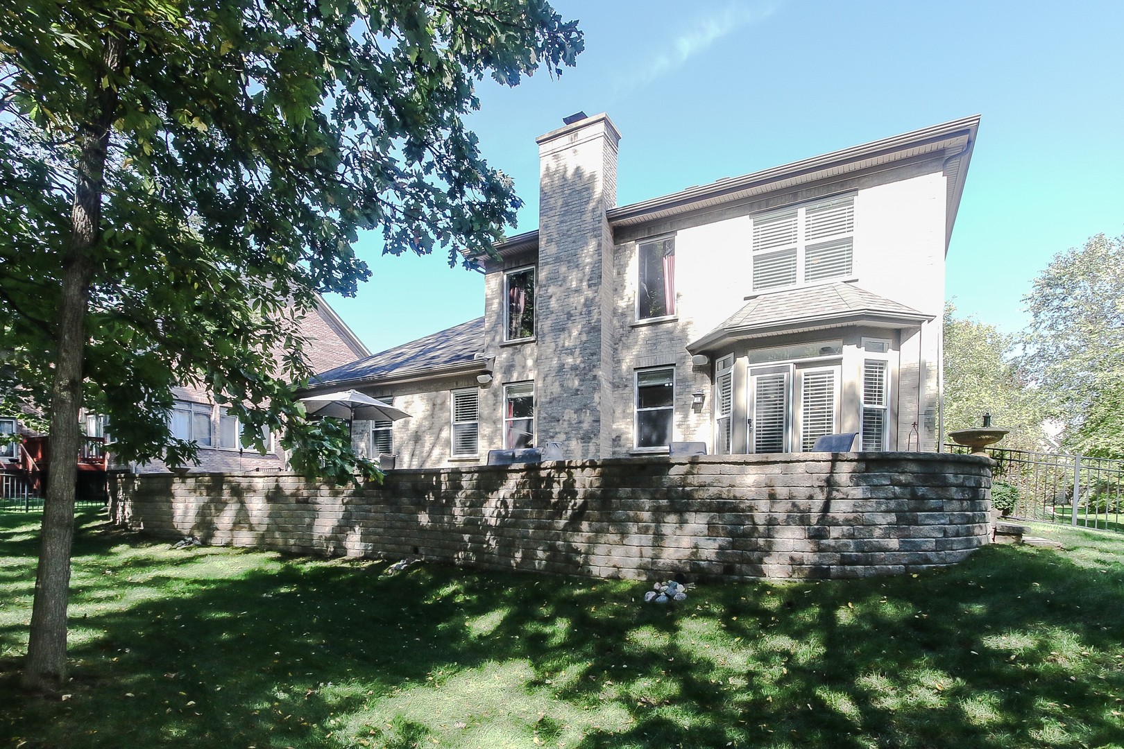 617 West Ruhl Road Palatine, IL 60074 - Photo 44 of 47 a front view of a house with a yard