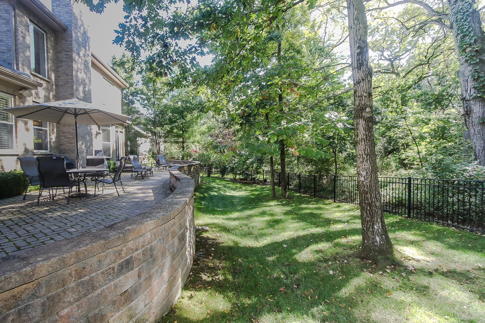 617 West Ruhl Road Palatine, IL 60074 - Photo 46 of 47 a backyard of a house with yard and outdoor seating
