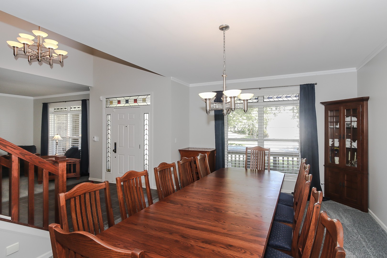 617 West Ruhl Road Palatine, IL 60074 - Photo 7 of 47 a view of a dining room with furniture wooden floor and chandelier