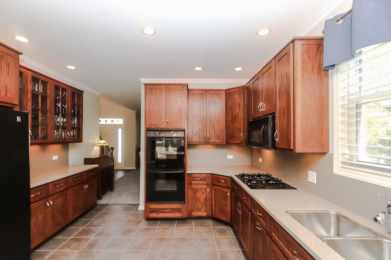 617 West Ruhl Road Palatine, IL 60074 - Photo 9 of 47 a kitchen with stainless steel appliances granite countertop a stove a sink and a refrigerator