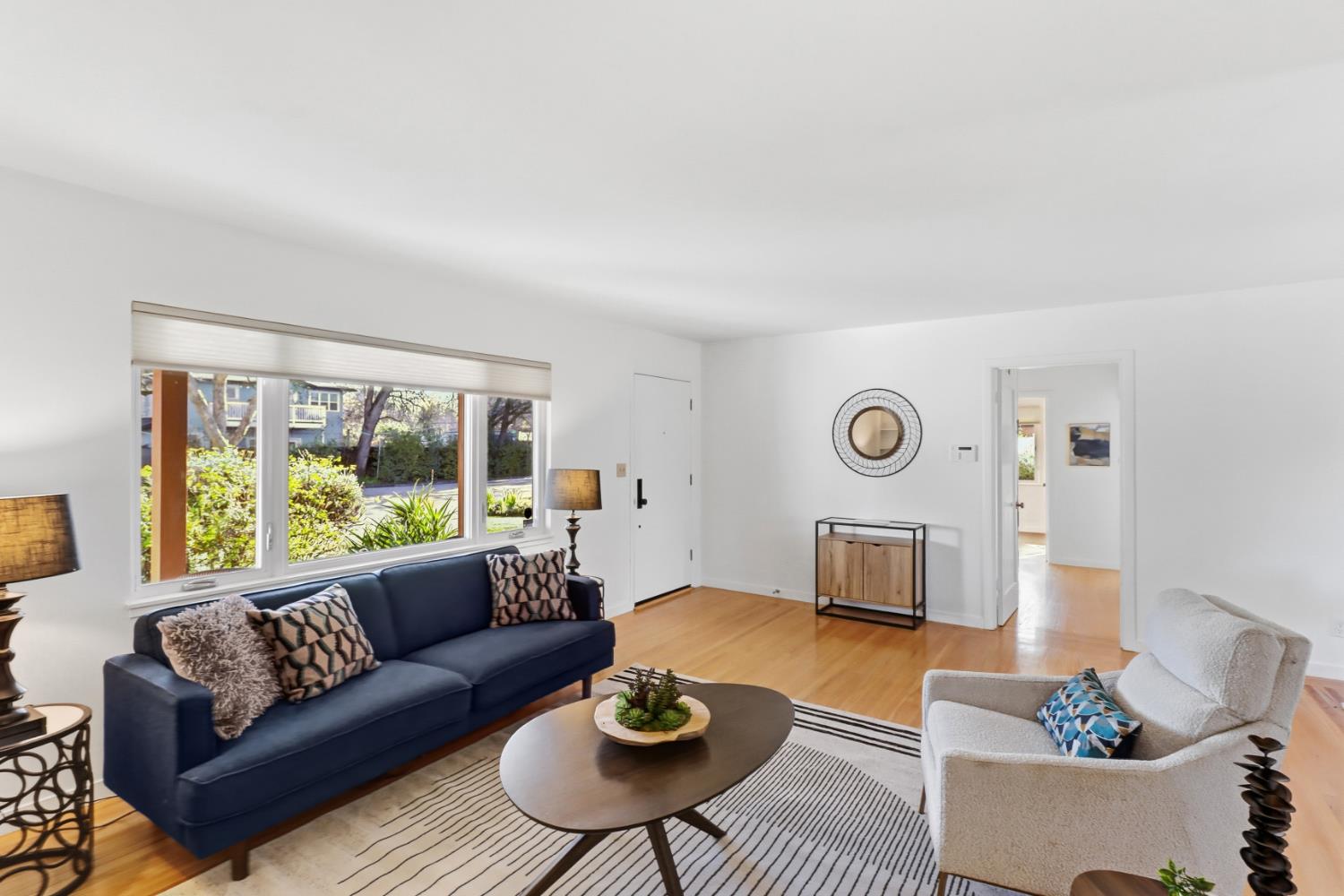 709 A Street Davis, CA 95616 - Photo 14 of 74 a living room with furniture and a large window