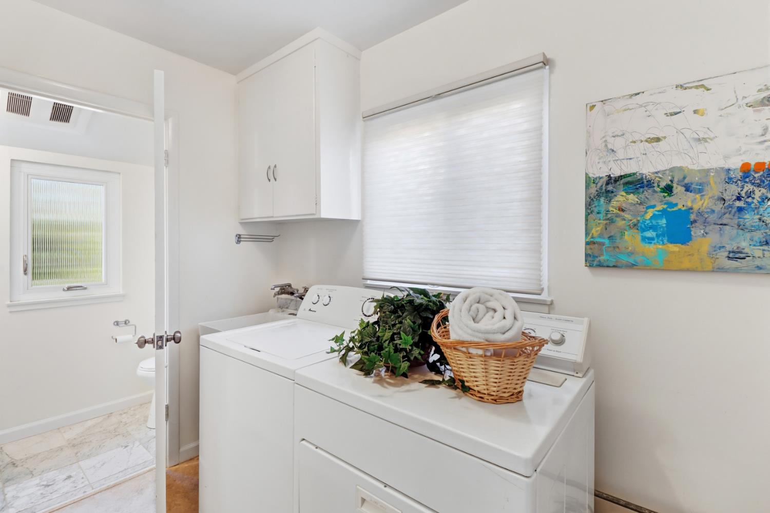 709 A Street Davis, CA 95616 - Photo 41 of 74 a bathroom with a sink a mirror and vanity