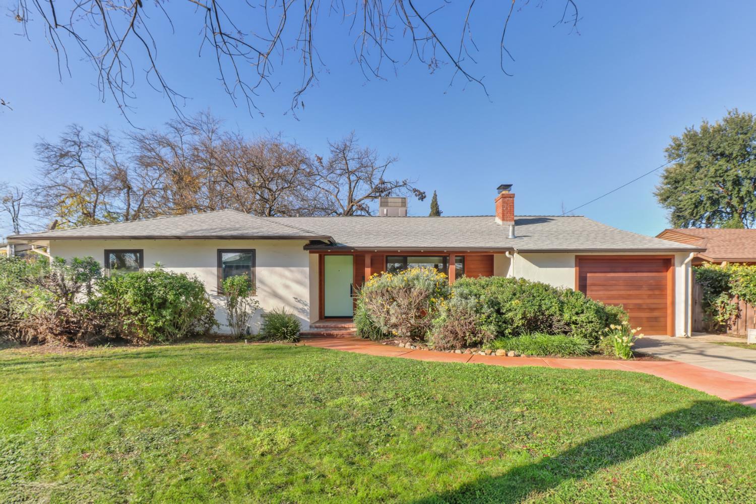 709 A Street Davis, CA 95616 - Photo 5 of 74 front view of a house with a yard