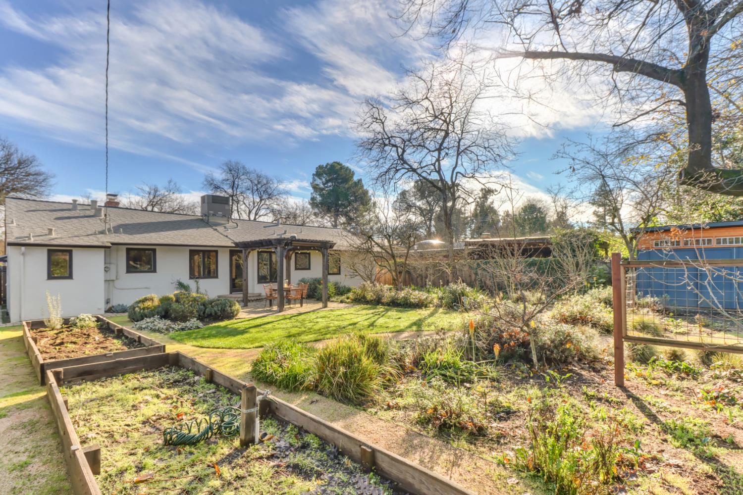 709 A Street Davis, CA 95616 - Photo 58 of 74 a view of a house with yard and sitting area