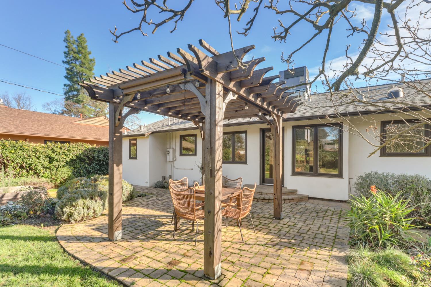709 A Street Davis, CA 95616 - Photo 60 of 74 a view of a house with a tree in the yard