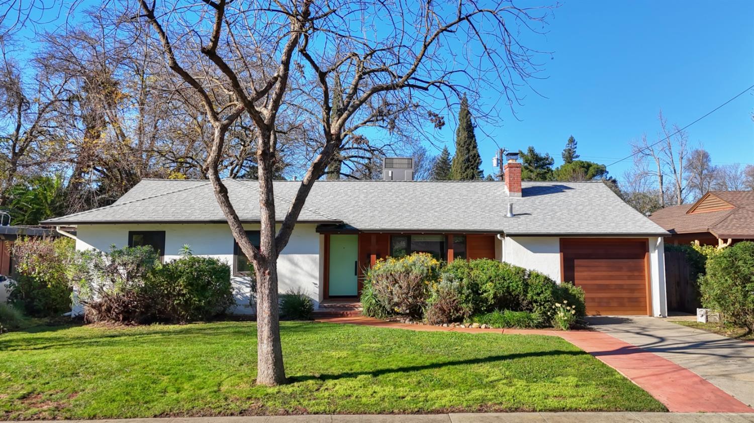709 A Street Davis, CA 95616 - Photo 65 of 74 a front view of a house with a yard
