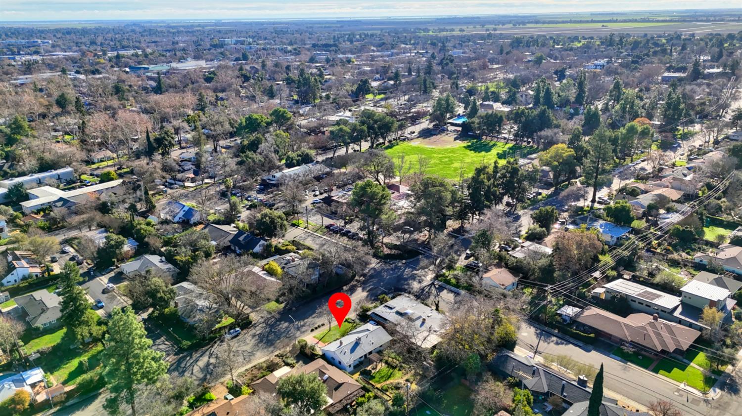 709 A Street Davis, CA 95616 - Photo 72 of 74 an aerial view of residential houses with outdoor space and swimming pool