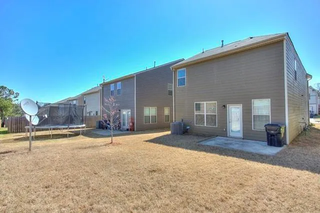 a view of a house with a patio