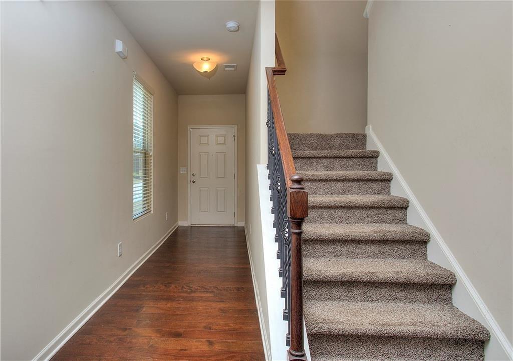 565 Dasheill Lane Atlanta, GA 30349 - Photo 2 of 11 a view of a hallway with wooden floor and entryway