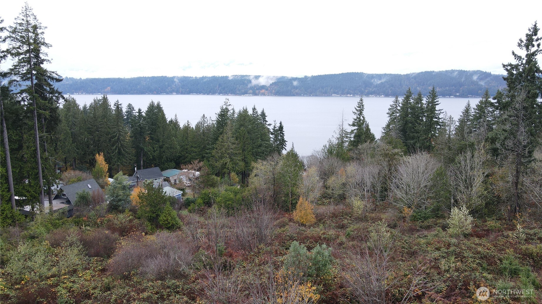 0 East Twanoh Heights Road North Belfair, WA 98528 - Photo 23 of 29 a view of a house with a mountain in the background