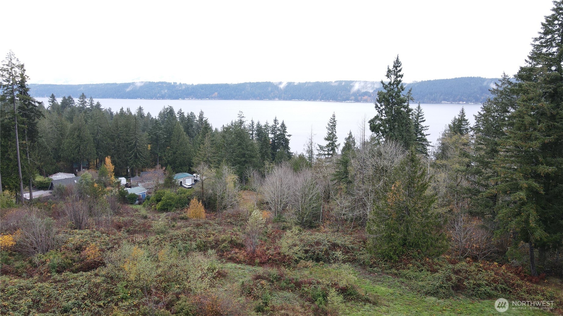 0 East Twanoh Heights Road North Belfair, WA 98528 - Photo 27 of 29 a view of a lake with a mountain in the background