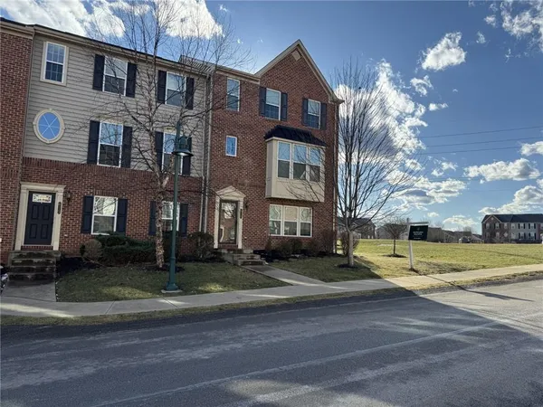a view of a building with a street