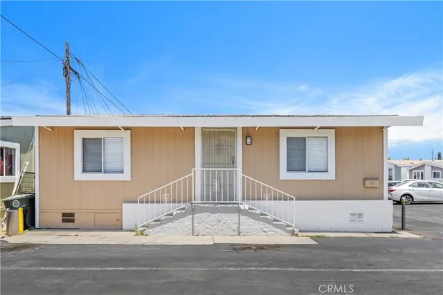 a view of a house with a street