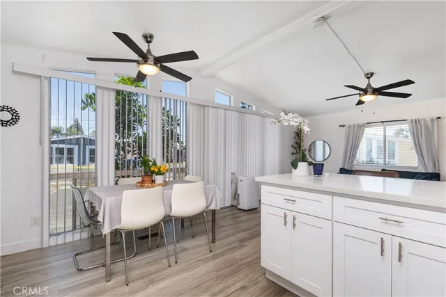 a view of a kitchen and dining room