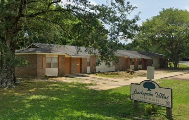 123 Lee Road Other, AL 36832 - Photo 2 of 6 a view of a house with backyard and sitting area