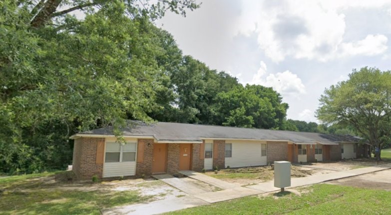 123 Lee Road Other, AL 36832 - Photo 5 of 6 a front view of a house with a yard