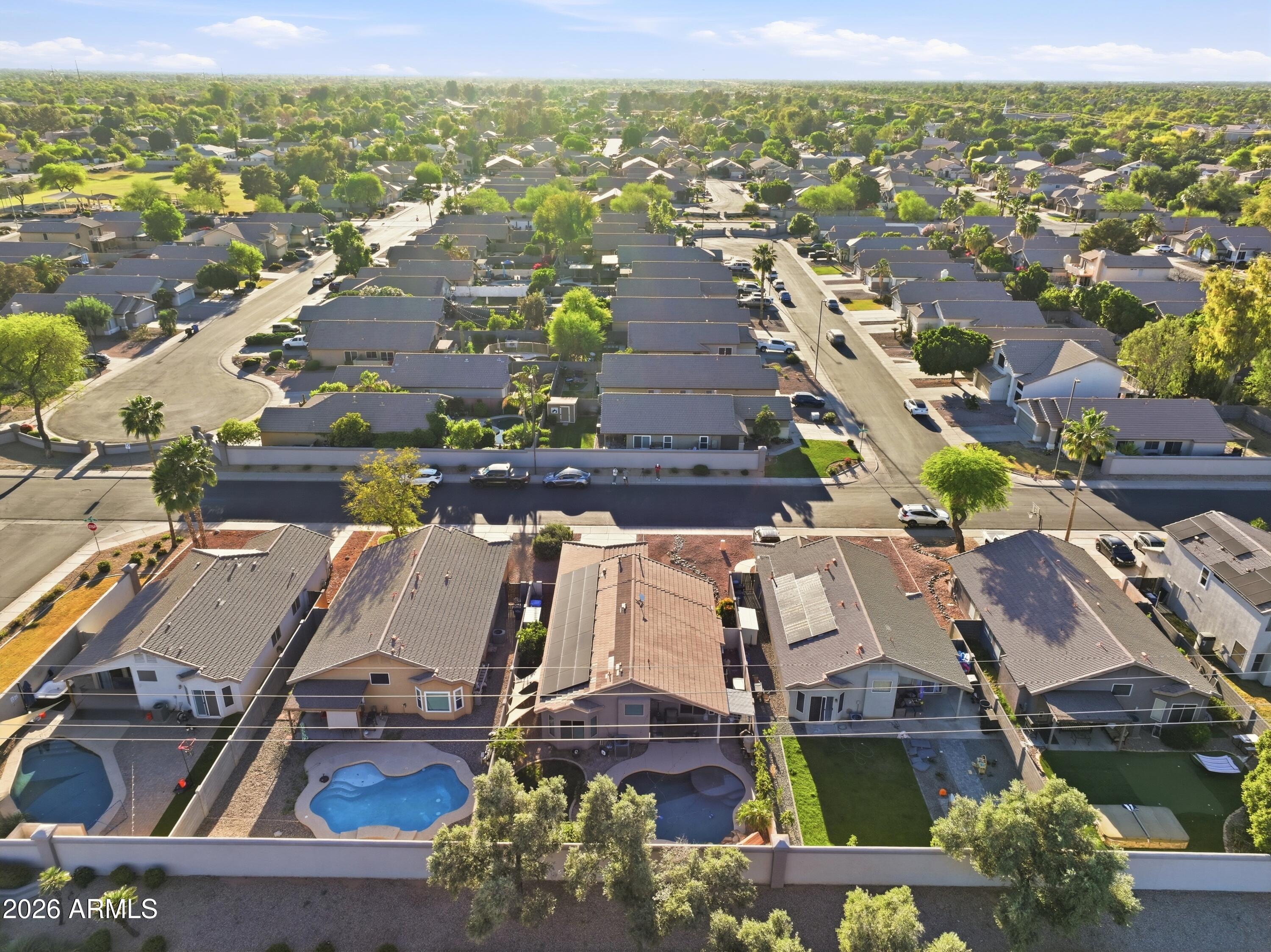661 North Joshua Tree Lane Gilbert, AZ 85234 - Photo 40 of 47 an aerial view of residential houses with outdoor space