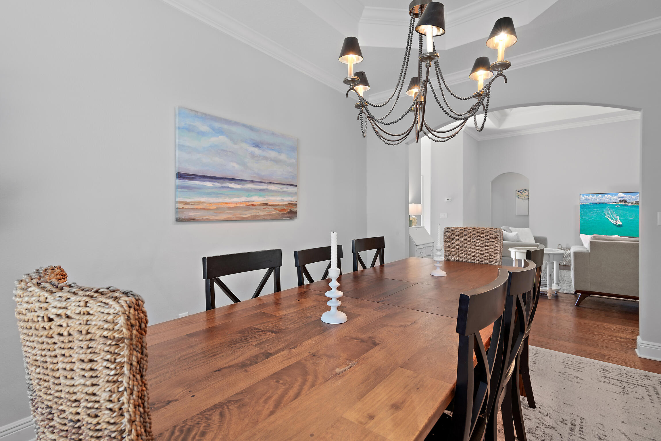 90 Ocean Spray Circle Santa Rosa Beach, FL 32459 - Photo 13 of 57 a view of a dining room with furniture and wooden floor